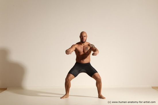 Underwear Gymnastic poses Man Black Muscular Bald Dancing Dynamic poses Academic