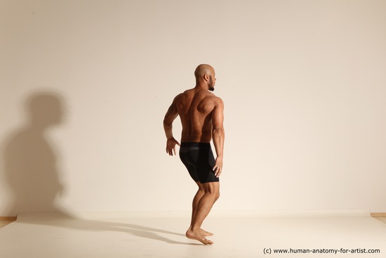 Underwear Gymnastic poses Man Black Muscular Bald Dancing Dynamic poses Academic