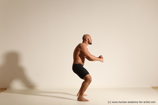 Underwear Gymnastic poses Man Black Muscular Bald Dancing Dynamic poses Academic