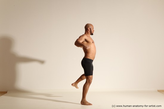 Underwear Gymnastic poses Man Black Muscular Bald Dancing Dynamic poses Academic