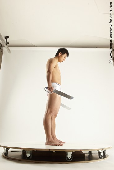 Underwear Fighting with knife Man Asian Average Medium Black Multi angles poses Academic