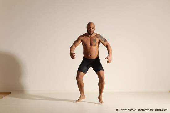 Underwear Gymnastic poses Man Black Muscular Bald Dancing Dynamic poses Academic