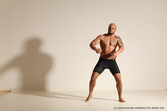 Underwear Gymnastic poses Man Black Muscular Bald Dancing Dynamic poses Academic