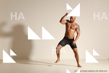 Underwear Gymnastic poses Man Black Muscular Bald Dancing Dynamic poses Academic