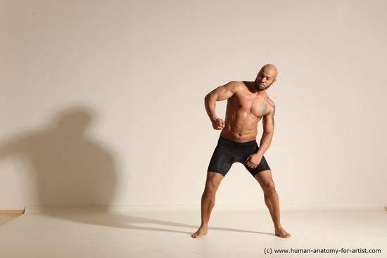 Underwear Gymnastic poses Man Black Muscular Bald Dancing Dynamic poses Academic