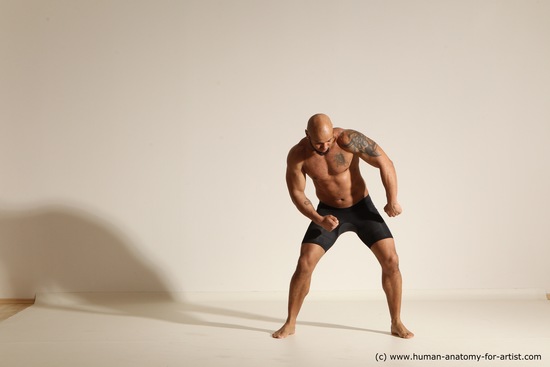 Underwear Gymnastic poses Man Black Muscular Bald Dancing Dynamic poses Academic