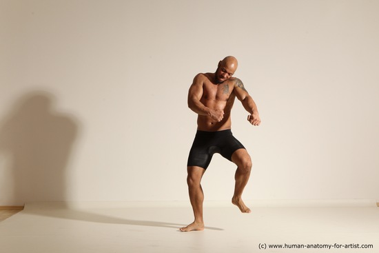 Underwear Gymnastic poses Man Black Muscular Bald Dancing Dynamic poses Academic