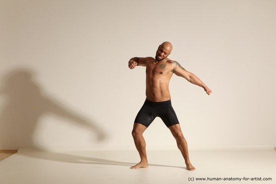 Underwear Gymnastic poses Man Black Muscular Bald Dancing Dynamic poses Academic