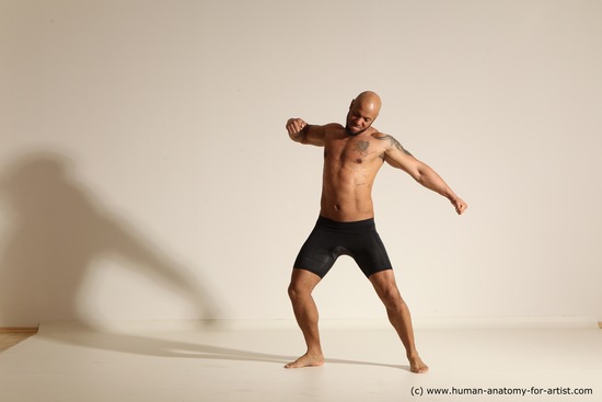 Underwear Gymnastic poses Man Black Muscular Bald Dancing Dynamic poses Academic