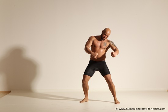 Underwear Gymnastic poses Man Black Muscular Bald Dancing Dynamic poses Academic