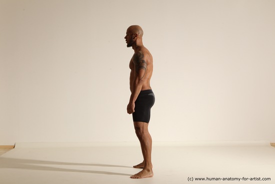 Underwear Gymnastic poses Man Black Muscular Bald Dancing Dynamic poses Academic