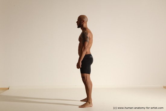 Underwear Gymnastic poses Man Black Muscular Bald Dancing Dynamic poses Academic