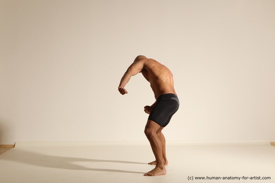 Underwear Gymnastic poses Man Black Muscular Bald Dancing Dynamic poses Academic