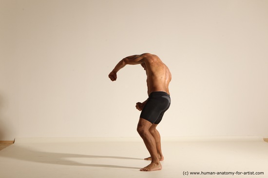 Underwear Gymnastic poses Man Black Muscular Bald Dancing Dynamic poses Academic