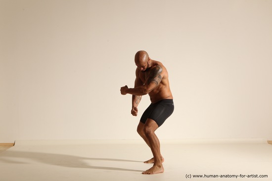 Underwear Gymnastic poses Man Black Muscular Bald Dancing Dynamic poses Academic