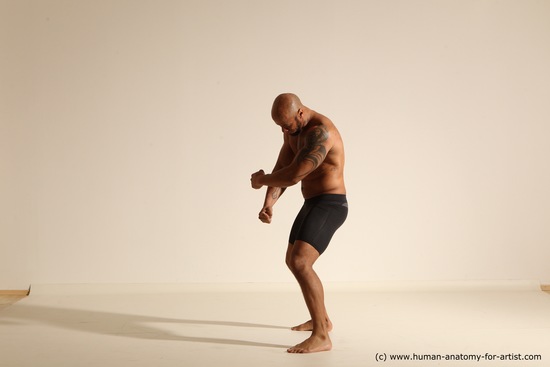 Underwear Gymnastic poses Man Black Muscular Bald Dancing Dynamic poses Academic