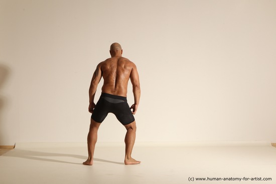 Underwear Gymnastic poses Man Black Muscular Bald Dancing Dynamic poses Academic