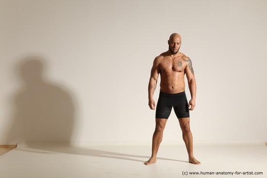 Underwear Gymnastic poses Man Black Muscular Bald Dancing Dynamic poses Academic