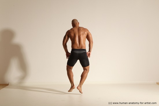 Underwear Gymnastic poses Man Black Muscular Bald Dancing Dynamic poses Academic