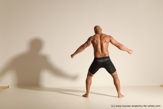 Underwear Gymnastic poses Man Black Muscular Bald Dancing Dynamic poses Academic