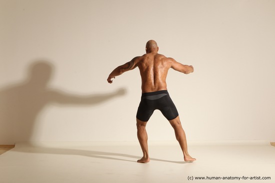 Underwear Gymnastic poses Man Black Muscular Bald Dancing Dynamic poses Academic