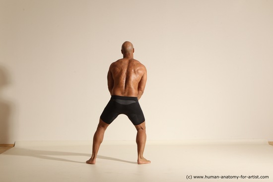 Underwear Gymnastic poses Man Black Muscular Bald Dancing Dynamic poses Academic