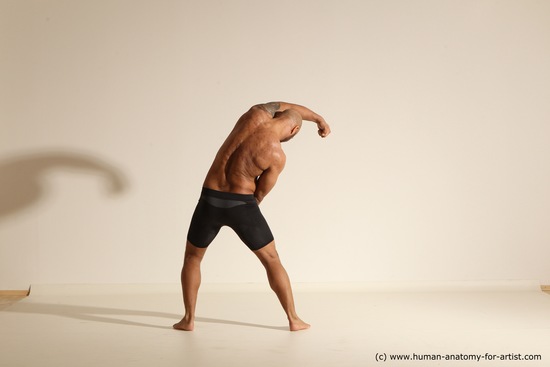 Underwear Gymnastic poses Man Black Muscular Bald Dancing Dynamic poses Academic