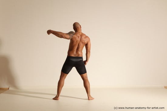 Underwear Gymnastic poses Man Black Muscular Bald Dancing Dynamic poses Academic