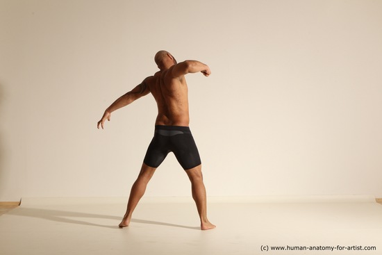 Underwear Gymnastic poses Man Black Muscular Bald Dancing Dynamic poses Academic