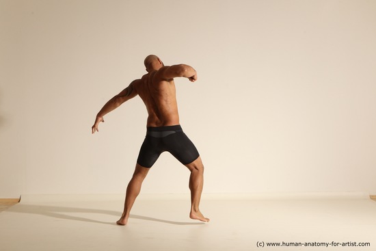 Underwear Gymnastic poses Man Black Muscular Bald Dancing Dynamic poses Academic