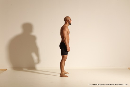 Underwear Gymnastic poses Man Black Muscular Bald Dancing Dynamic poses Academic