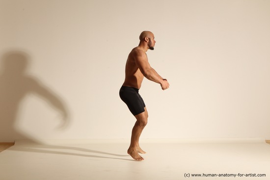 Underwear Gymnastic poses Man Black Muscular Bald Dancing Dynamic poses Academic