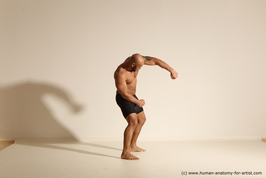 Underwear Gymnastic poses Man Black Muscular Bald Dancing Dynamic poses Academic