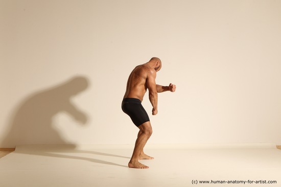 Underwear Gymnastic poses Man Black Muscular Bald Dancing Dynamic poses Academic