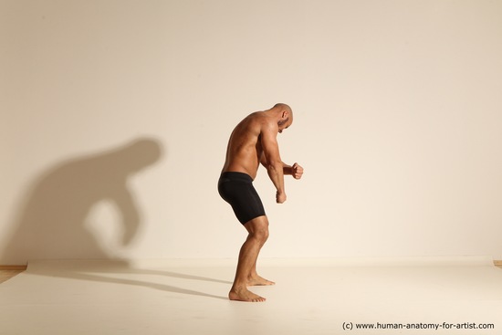 Underwear Gymnastic poses Man Black Muscular Bald Dancing Dynamic poses Academic