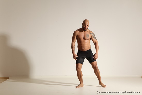 Underwear Gymnastic poses Man Black Muscular Bald Dancing Dynamic poses Academic