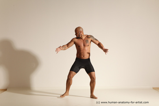 Underwear Gymnastic poses Man Black Muscular Bald Dancing Dynamic poses Academic