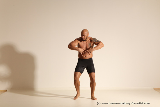 Underwear Gymnastic poses Man Black Muscular Bald Dancing Dynamic poses Academic