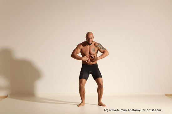 Underwear Gymnastic poses Man Black Muscular Bald Dancing Dynamic poses Academic