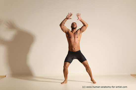 Underwear Gymnastic poses Man Black Muscular Bald Dancing Dynamic poses Academic