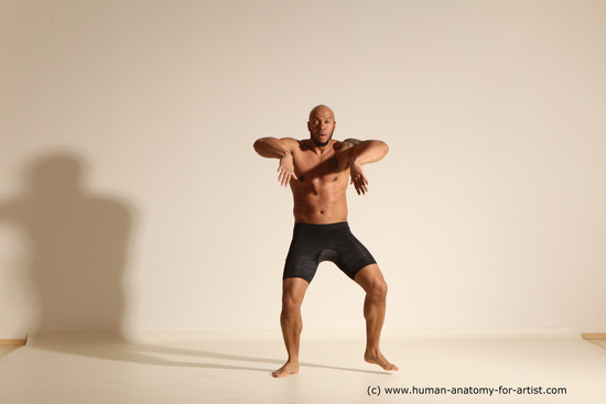 Underwear Gymnastic poses Man Black Muscular Bald Dancing Dynamic poses Academic