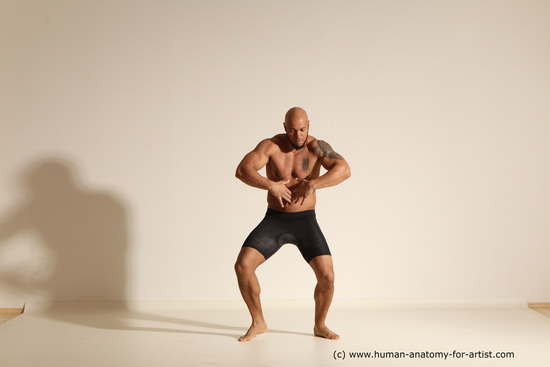 Underwear Gymnastic poses Man Black Muscular Bald Dancing Dynamic poses Academic