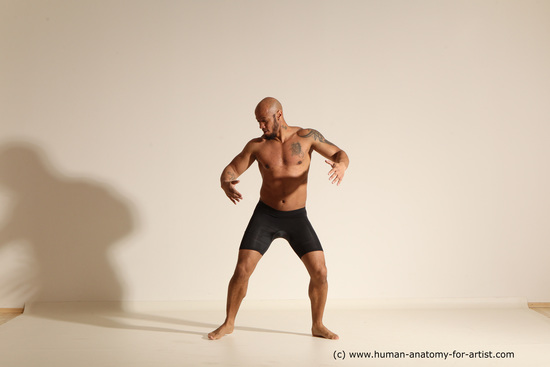 Underwear Gymnastic poses Man Black Muscular Bald Dancing Dynamic poses Academic