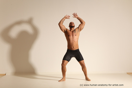 Underwear Gymnastic poses Man Black Muscular Bald Dancing Dynamic poses Academic