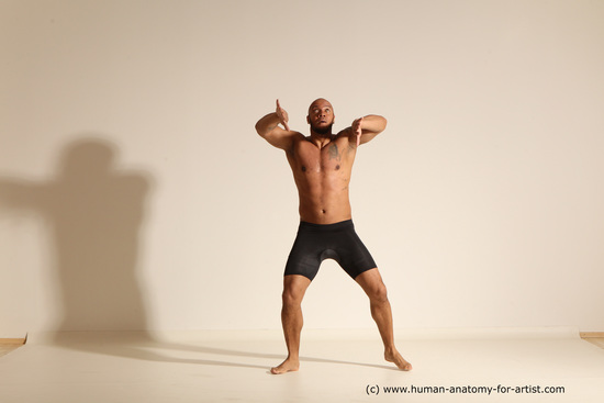 Underwear Gymnastic poses Man Black Muscular Bald Dancing Dynamic poses Academic