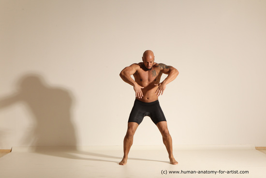 Underwear Gymnastic poses Man Black Muscular Bald Dancing Dynamic poses Academic