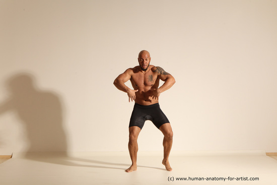 Underwear Gymnastic poses Man Black Muscular Bald Dancing Dynamic poses Academic