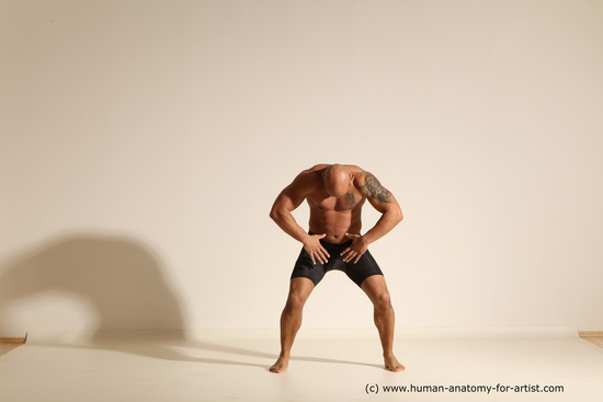 Underwear Gymnastic poses Man Black Muscular Bald Dancing Dynamic poses Academic