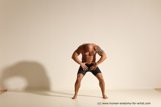 Underwear Gymnastic poses Man Black Muscular Bald Dancing Dynamic poses Academic