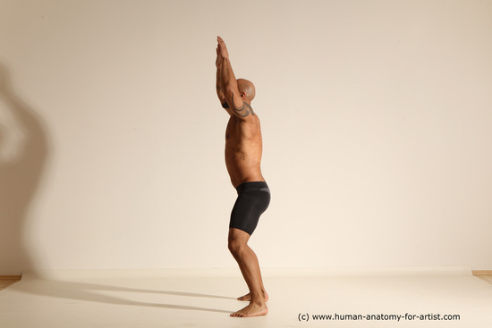 Underwear Gymnastic poses Man Black Muscular Bald Dancing Dynamic poses Academic